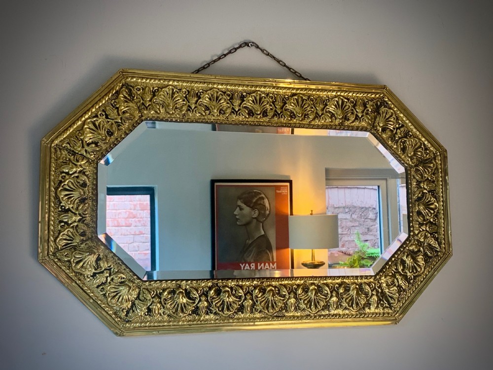 ARTS AND CRAFTS OCTAGONAL BRASS REPOUSSE MIRROR