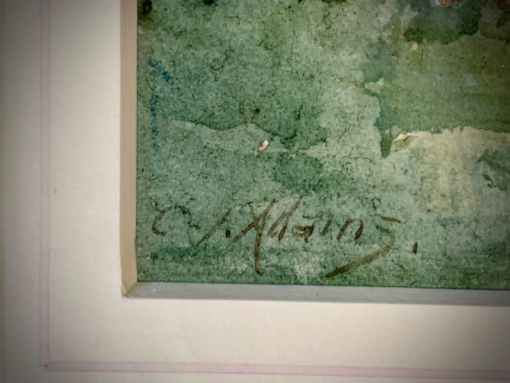 An antique framed watercolour painting depicting a shepherd driving sheep across a green moorland beneath a cloudy sky, set within a cream mount and gold frame. View V