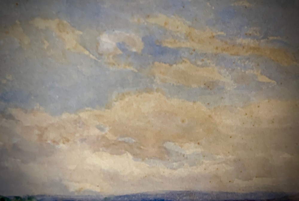 An antique framed watercolour painting depicting a shepherd driving sheep across a green moorland beneath a cloudy sky, set within a cream mount and gold frame. View VII