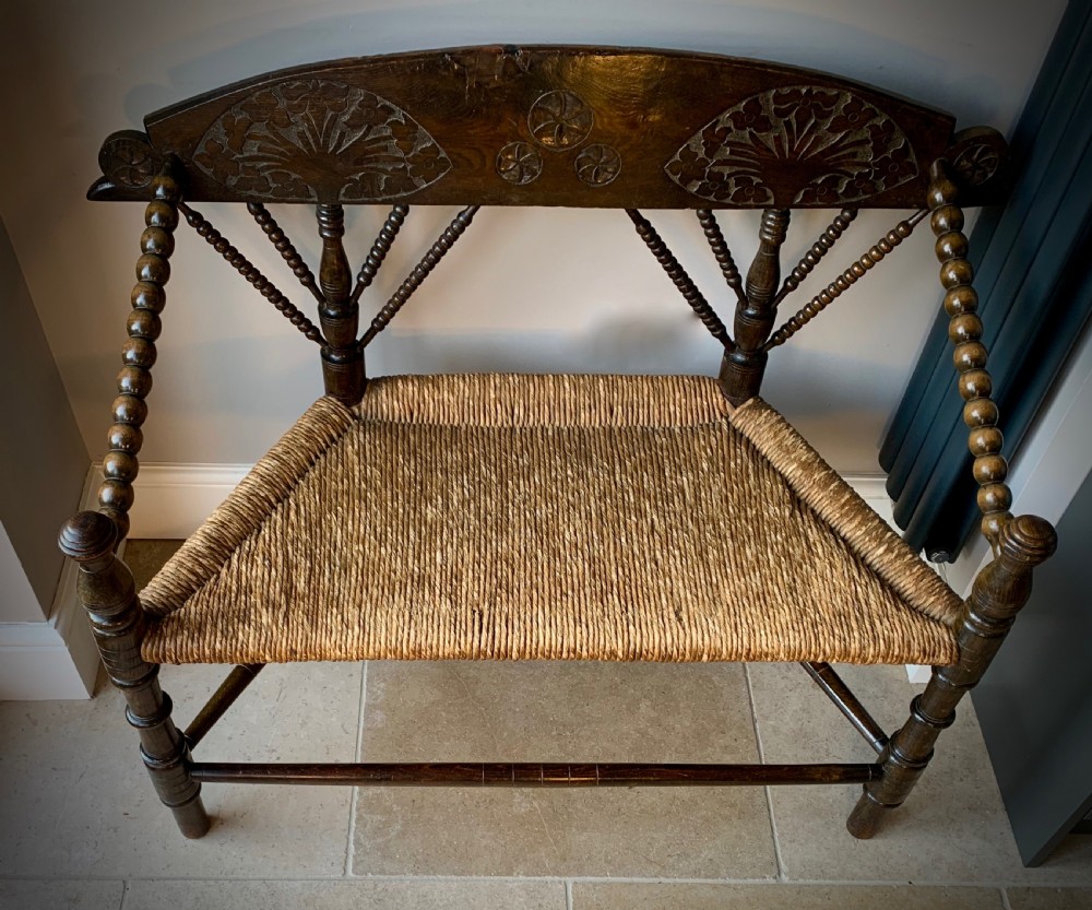 ARTS AND CRAFTS, TWO SEATER BOBBIN BENCH - DUTCH, EARLY 20TH CENTURY