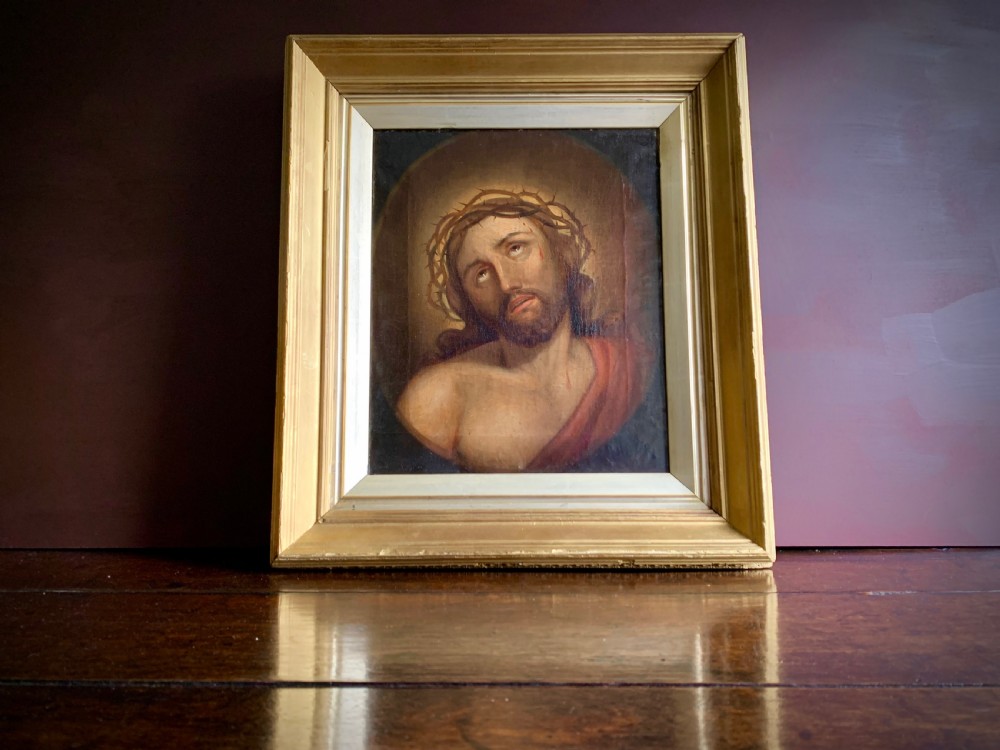 A 19th-century oil painting on canvas depicting Christ crowned with thorns set within a gold gilded wooden frame. View III