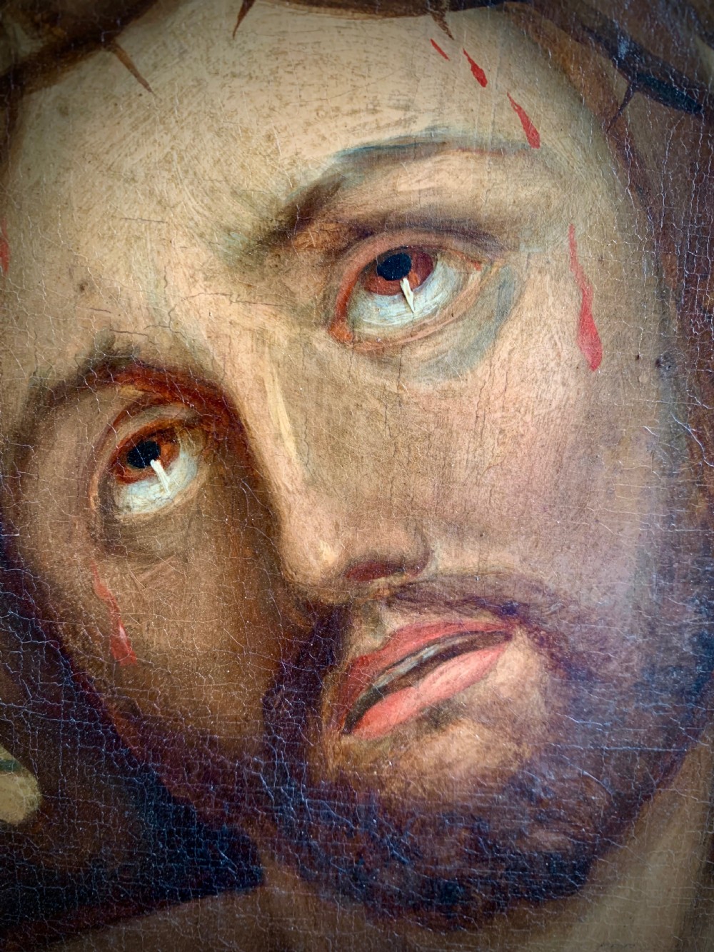 A 19th-century oil painting on canvas depicting Christ crowned with thorns set within a gold gilded wooden frame. View VI