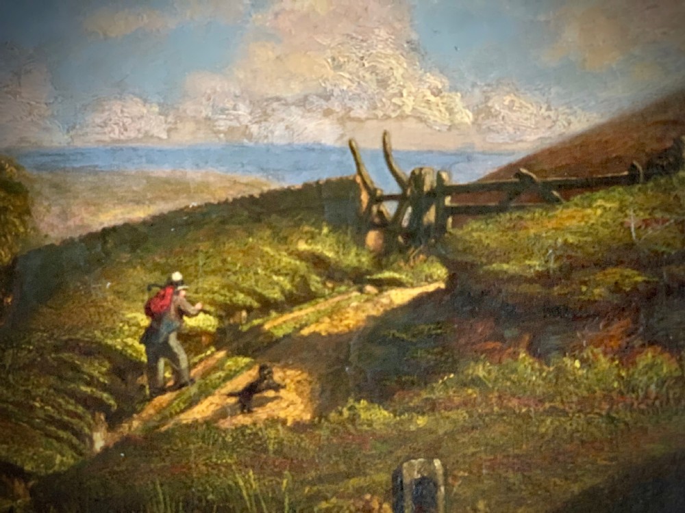 A nineteenth-century framed landscape oil painting depicting a figure walking along a sunlit green hillside. View II