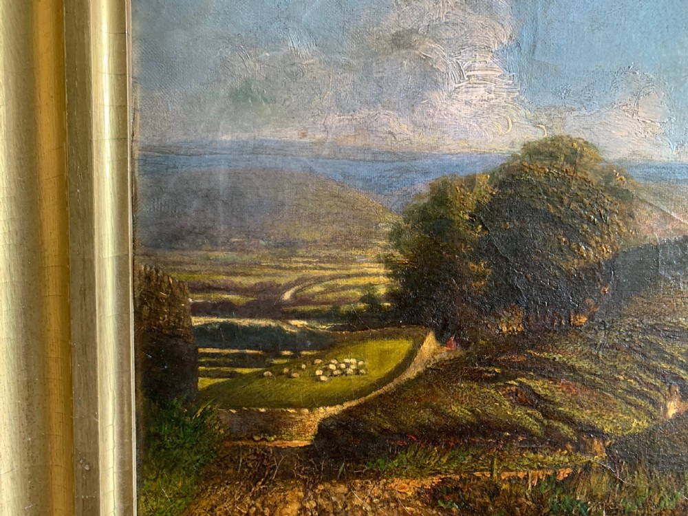 A nineteenth-century framed landscape oil painting depicting a figure walking along a sunlit green hillside. View VII