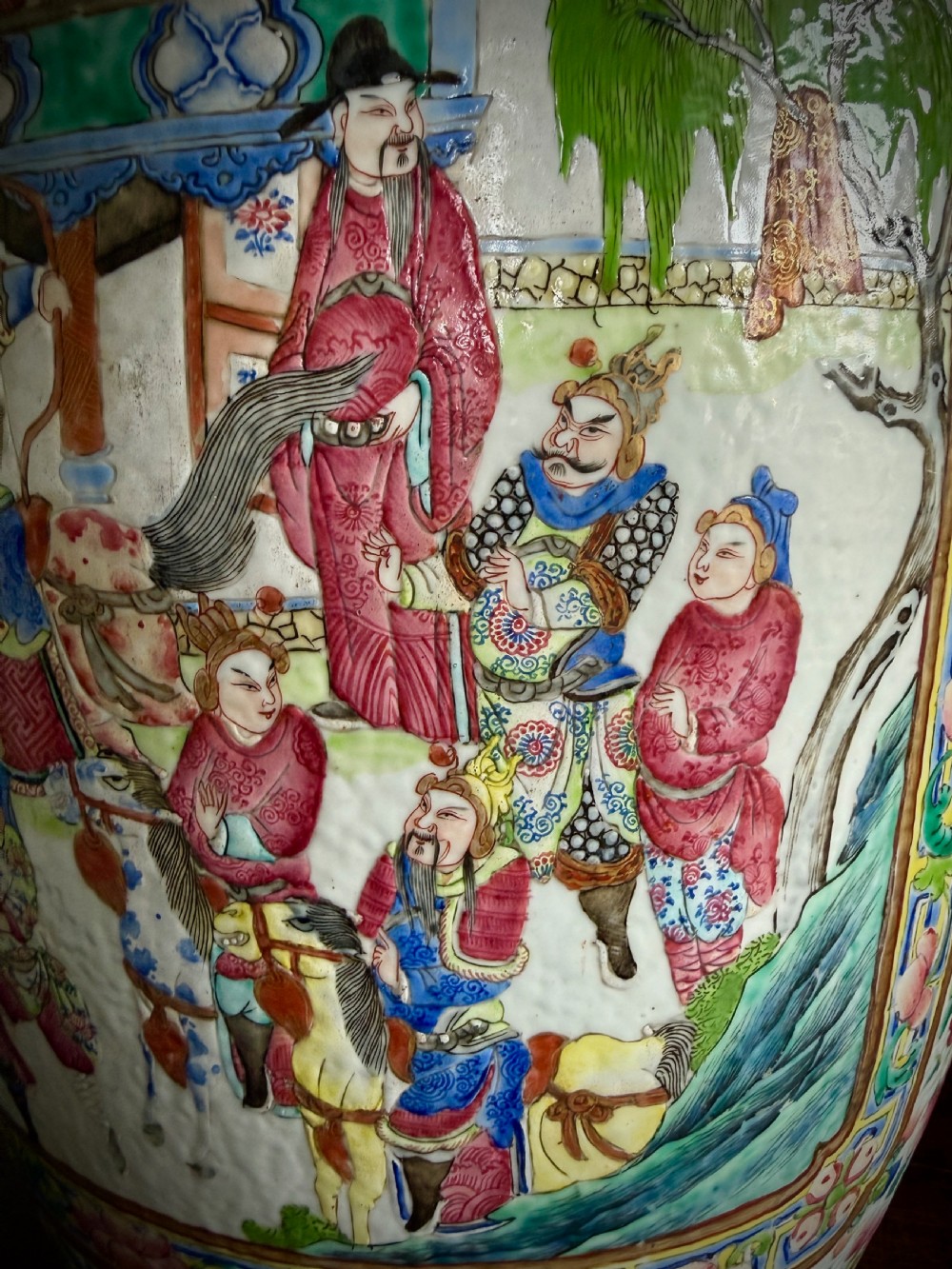 A large 19th-century Cantonese porcelain floor vase decorated with polychrome enamel court scenes, floral borders, and gilded dragon handles. View XII