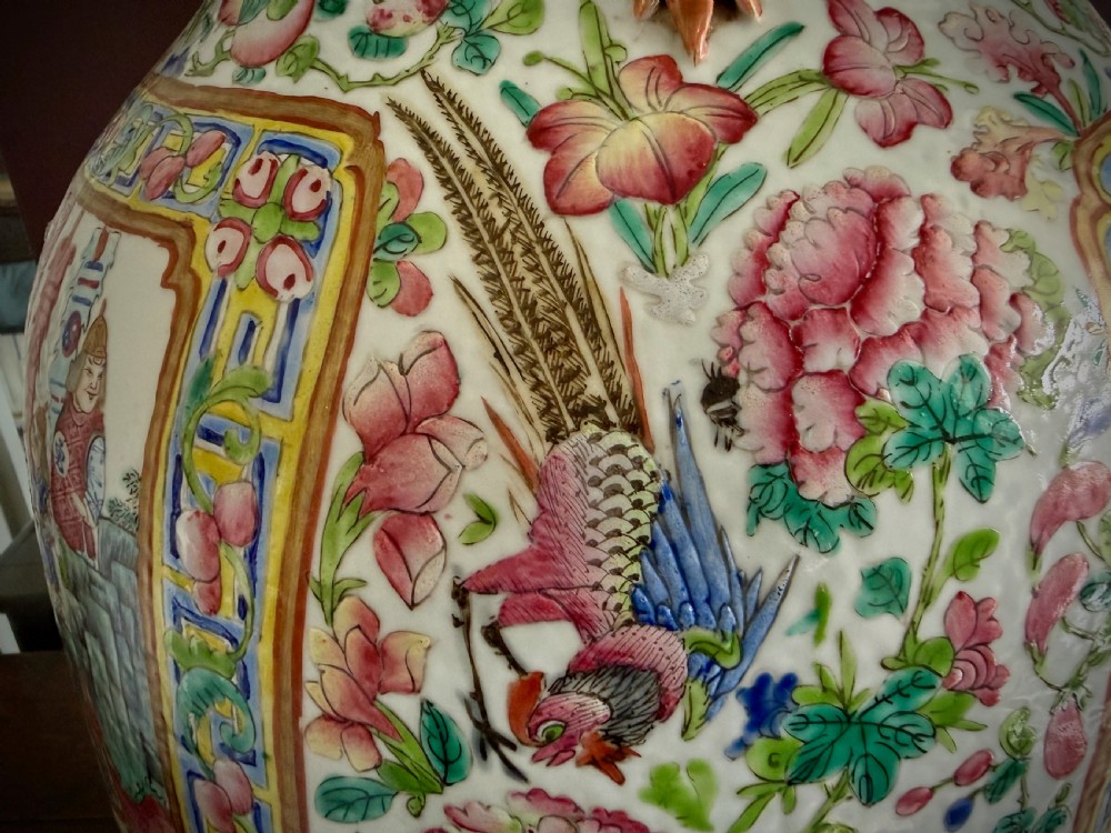 A large 19th-century Cantonese porcelain floor vase decorated with polychrome enamel court scenes, floral borders, and gilded dragon handles. View XXI
