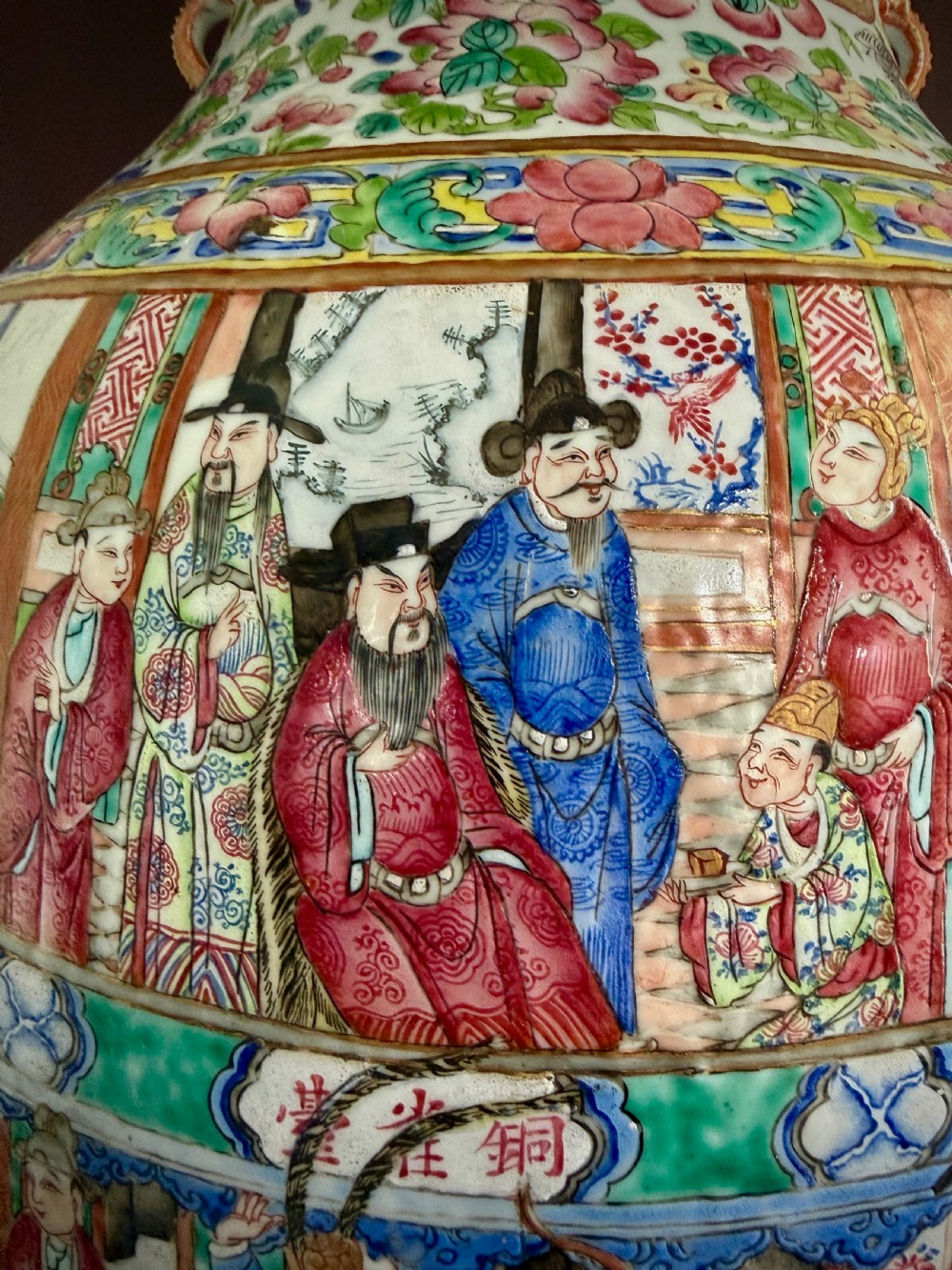 A large 19th-century Cantonese porcelain floor vase decorated with polychrome enamel court scenes, floral borders, and gilded dragon handles. View XXIII