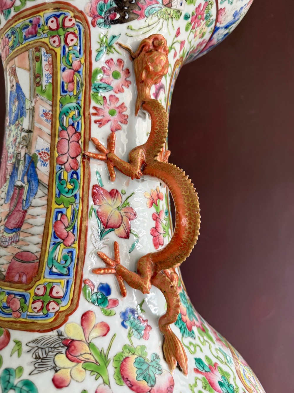 A large 19th-century Cantonese porcelain floor vase decorated with polychrome enamel court scenes, floral borders, and gilded dragon handles. View XXIV