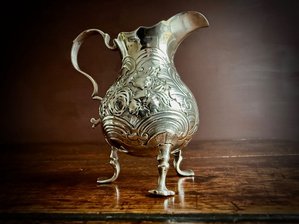 GEORGE II STIRLING SILVER THREE FOOTED CREAM JUG by GEORGE CAMPAR OF LONDON - 1755 View II