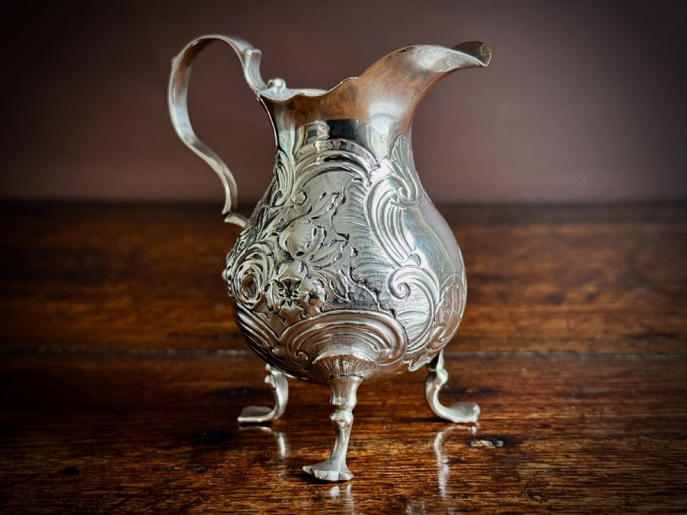 GEORGE II STIRLING SILVER THREE FOOTED CREAM JUG by GEORGE CAMPAR OF LONDON - 1755 View VI