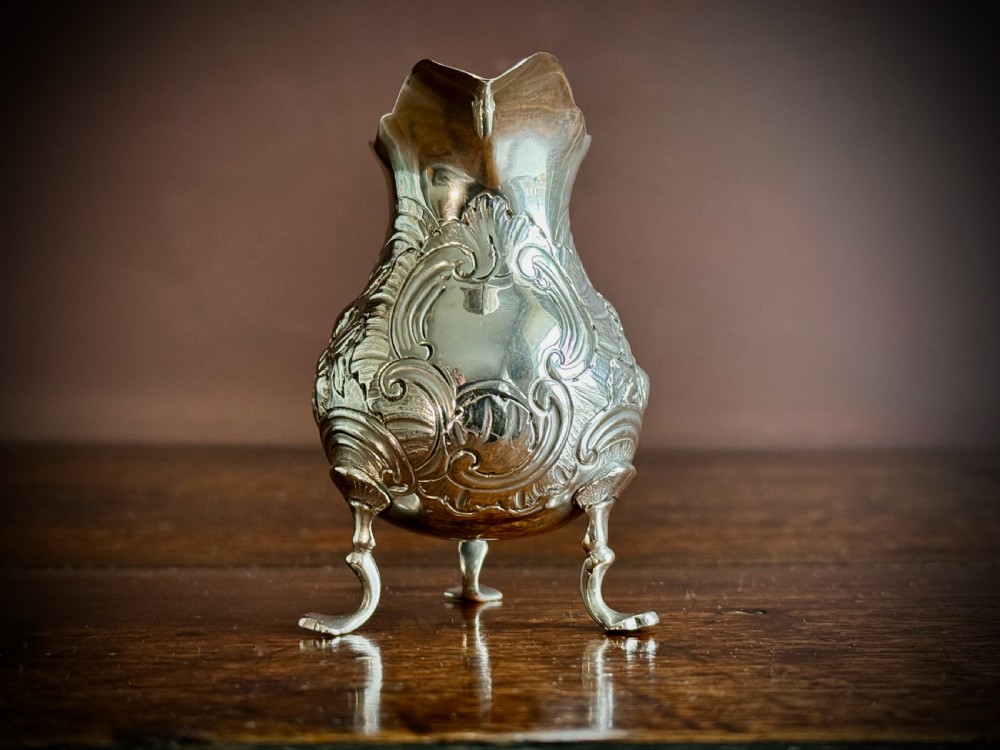 GEORGE II STIRLING SILVER THREE FOOTED CREAM JUG by GEORGE CAMPAR OF LONDON - 1755 View VIII
