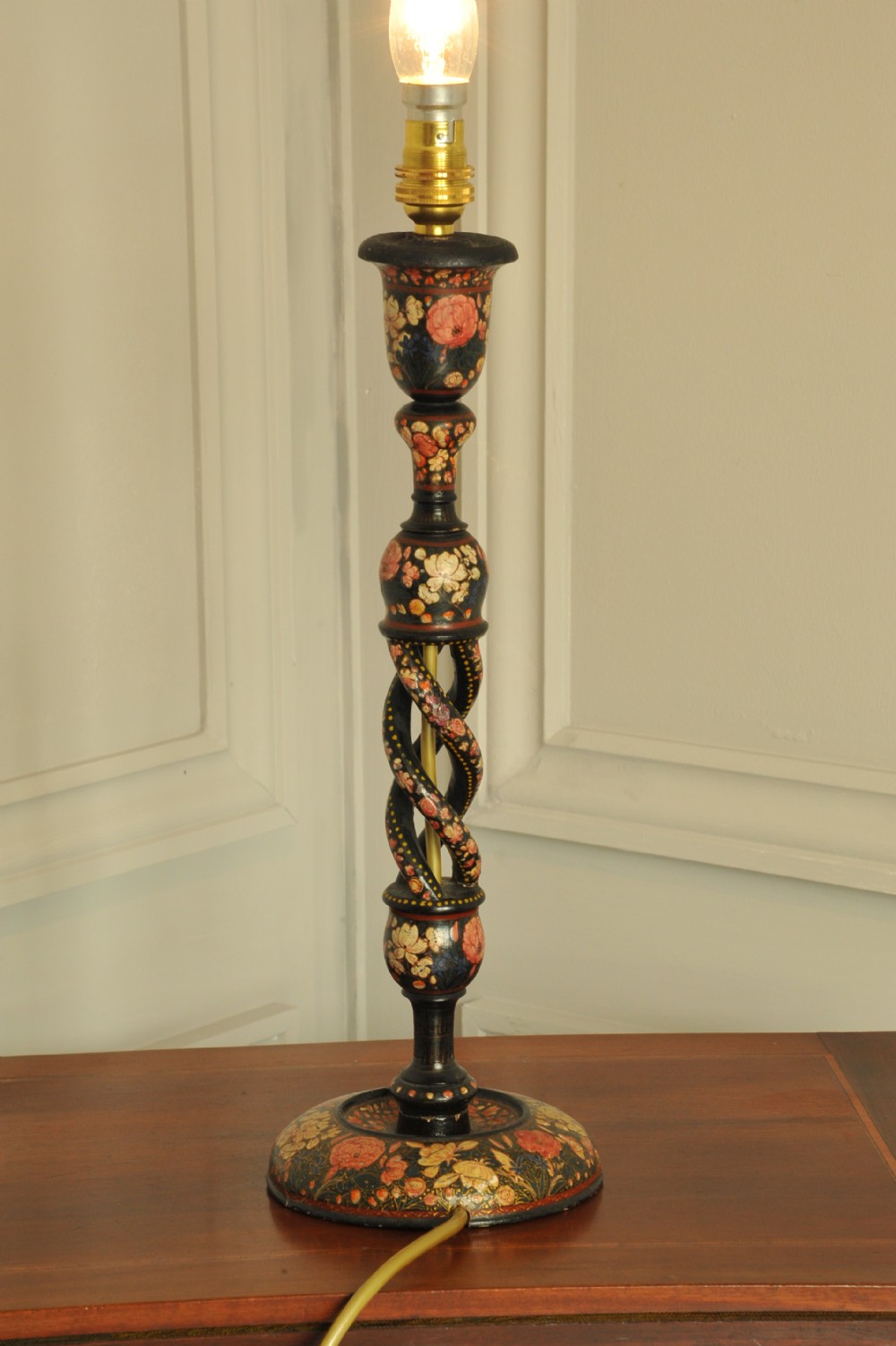 An antique Kashmiri open twist table lamp