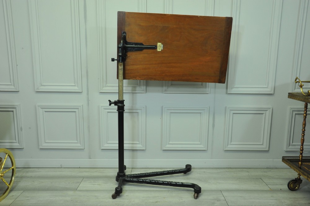 A good Antique Vintage Cast Iron and Mahogany Adjustable Bed  or Side
Table  View VI