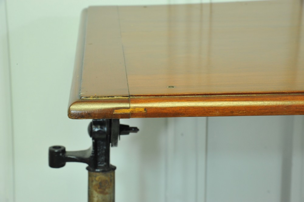 A good Antique Vintage Cast Iron and Mahogany Adjustable Bed  or Side
Table  View X
