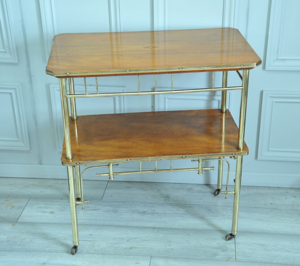 An Antique Vintage Early 20c Walnut and Brass two Tier Trolley Drinks Cart    