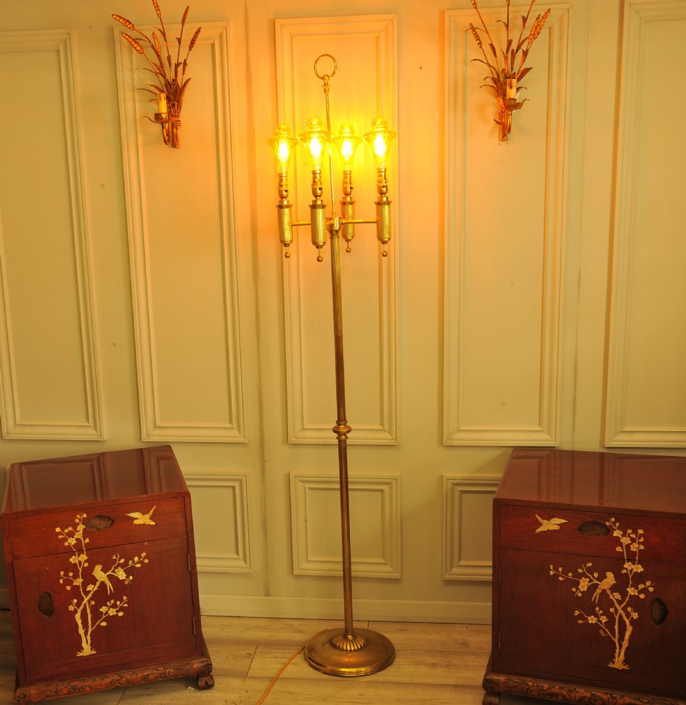 A brass French bouillotte style standard lamp featuring four fluted candle sockets with tulip glass shades and a central ring finial. View II