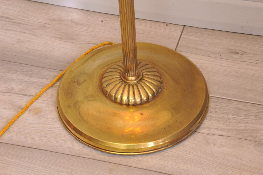 A brass French bouillotte style standard lamp featuring four fluted candle sockets with tulip glass shades and a central ring finial. View III