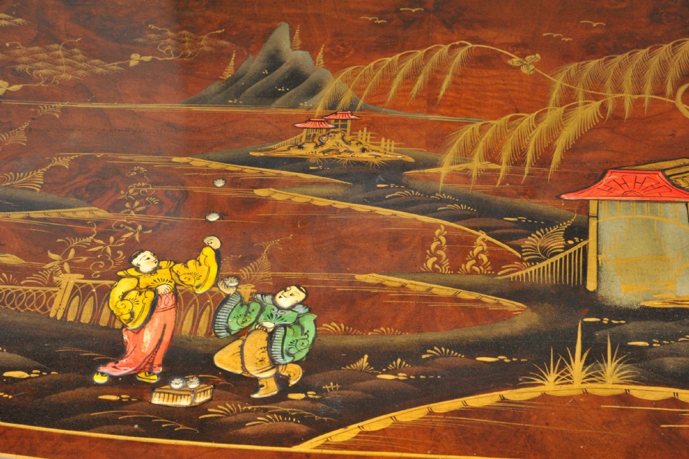 A circa 1910 semi-circular demi-lune cabinet featuring hand-painted Chinoiserie figures and landscapes with gilt details on cabriole legs. View XIX