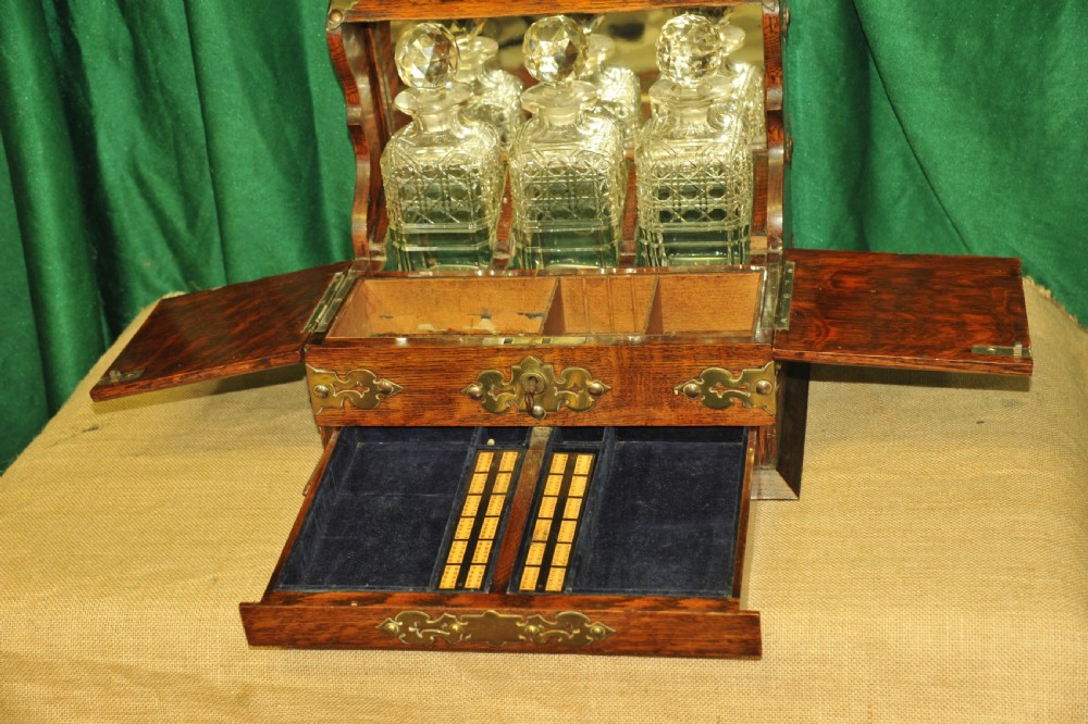 An Antique Oak Tantalus Games Compendium View XII