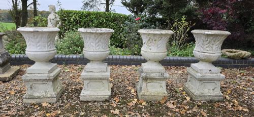 SET FOUR STONE URNS ON PLINTHS - ADDITIONAL PHOTO 1
