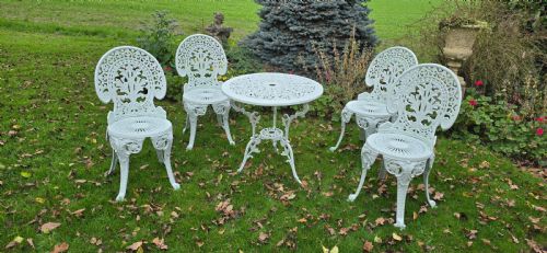 METAL PATIO TABLE AND FOUR CHAIRS - ADDITIONAL PHOTO 11
