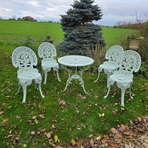metal patio table and four chairs - CATEGORY: ANTIQUE FURNITURE - DATED 1930