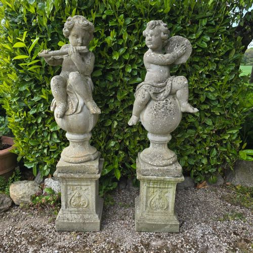 large pair stone cherubs on plinths - CATEGORY: ANTIQUE SCULPTURES - DATED 1920
