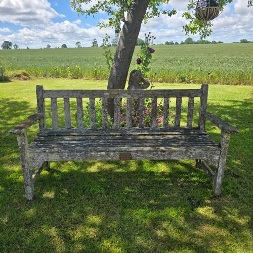 WELL WEATHERED TEAK GARDEN BENCH - ADDITIONAL PHOTO 1