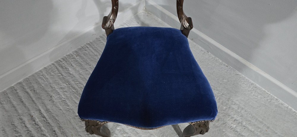 A Victorian rosewood side chair featuring an openwork balloon back, blue velvet upholstered seat, and cabriole legs. View VII
