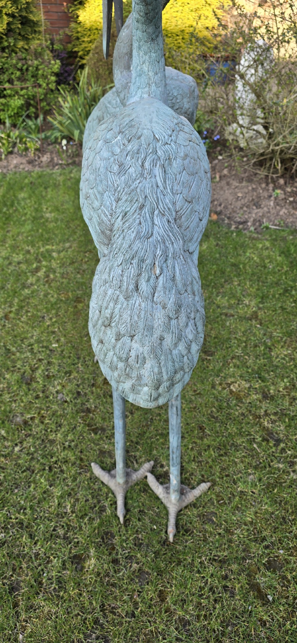 A pair of large cast metal crane statues featuring a weathered verdigris green finish and detailed feather texturing. View XI