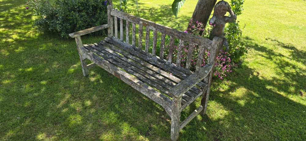 A rectangular slatted teak garden bench featuring a weathered grey oxidised finish, flat armrests, and square legs. View VIII