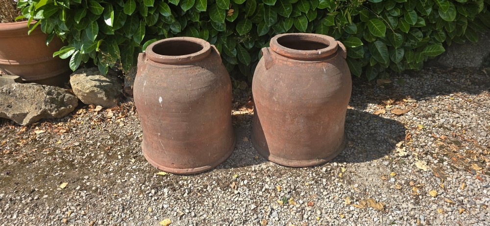 A pair of large Victorian terracotta rhubarb forcers with side handles and an aged clay surface. View III