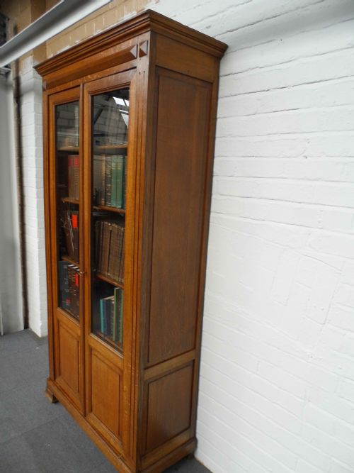FRENCH OAK BOOKCASE WITH GLAZED DOORS AND PANELLED DOORS - ADDITIONAL PHOTO 1