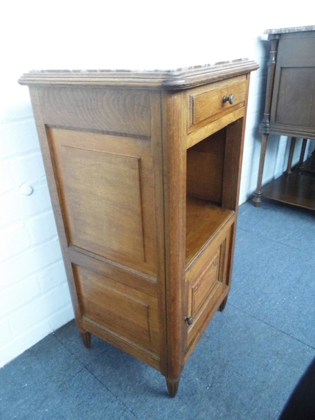 FRENCH OAK MARBLE TOP BEDSIDE CABINET. View II