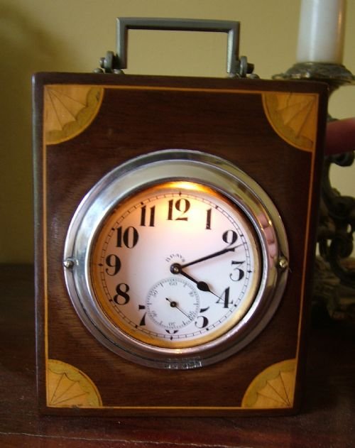 fig 1. Antique bedside / desk clock 8-day goliath pocket watch
Edwardian mahogany and satinwood inlaid case with light