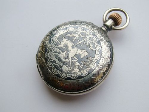 fig 1. Antique niello pocket watch with hunting dog scene