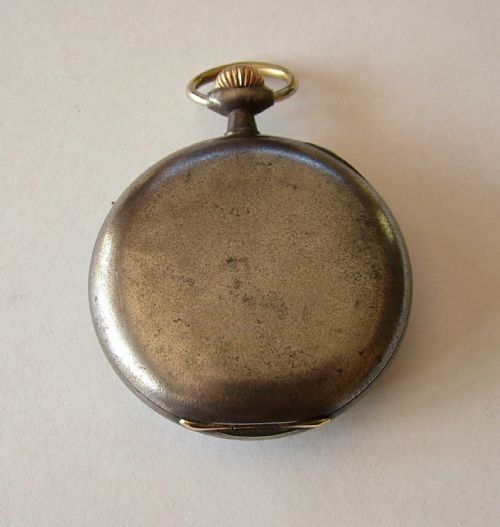fig 1. Antique 1912 Omega gun metal pocket watch