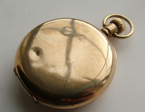fig 2. 1920s Cyma half hunter pocket watch
