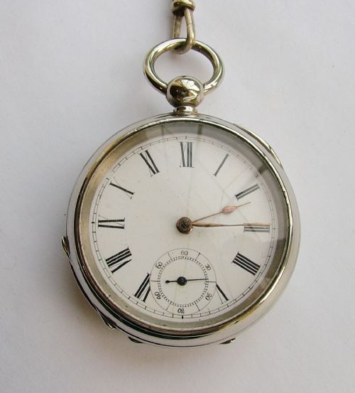 fig 2. Antique key-winding pocket watch, chain & fob
