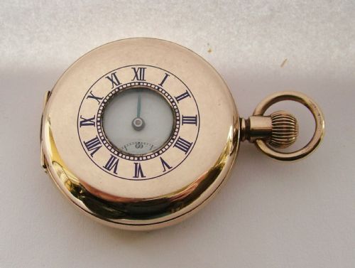 fig 1. Vintage 1920s gold plated half hunter pocket watch