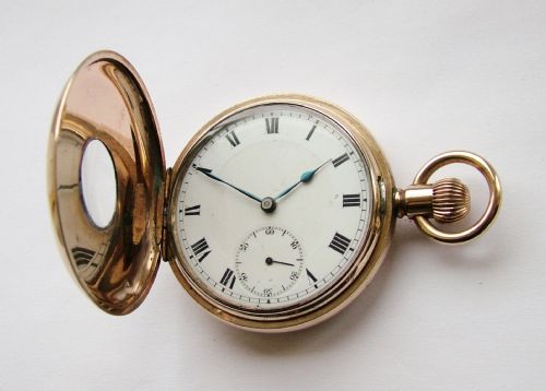 fig 2. Vintage 1920s gold plated half hunter pocket watch