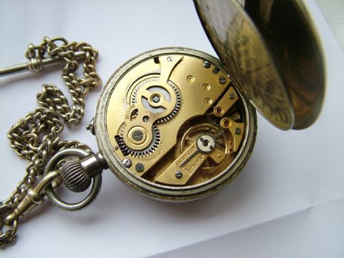 fig 1. 1920s nickel pocket watch and albert