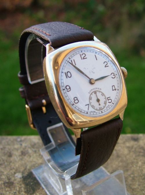 fig 1. Gents 1945 9ct gold Longines wrist watch