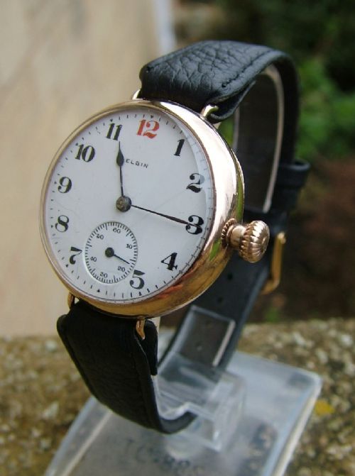 fig 1. Gents 9ct gold Elgin trench watch