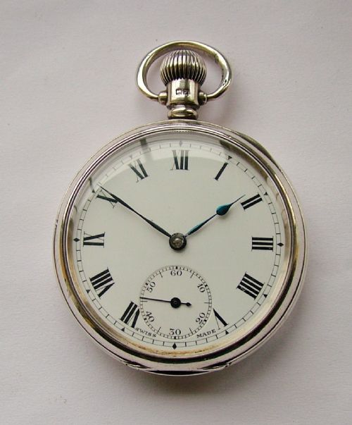 fig 1. Vintage 1923 silver Swiss stem winding pocket watch