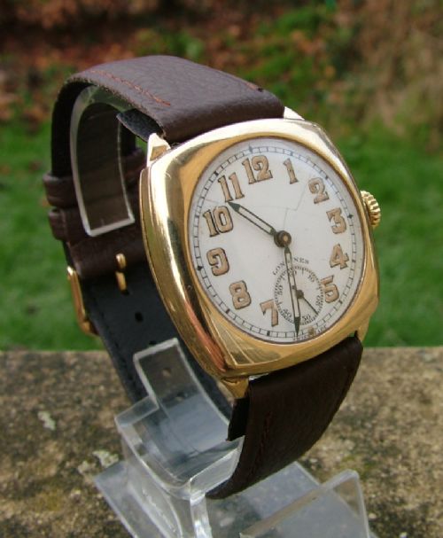 fig 1. Gents 9 carat gold Longines wrist watch, 1941