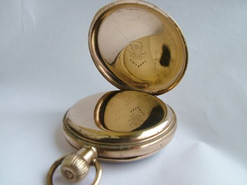 fig 1. Antique open faced pocket watch