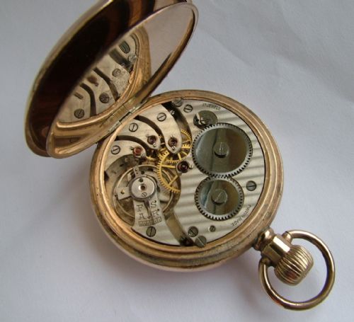 fig 2. Antique open faced pocket watch