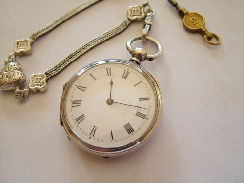 fig 1. Lady's antique fob watch with later chain