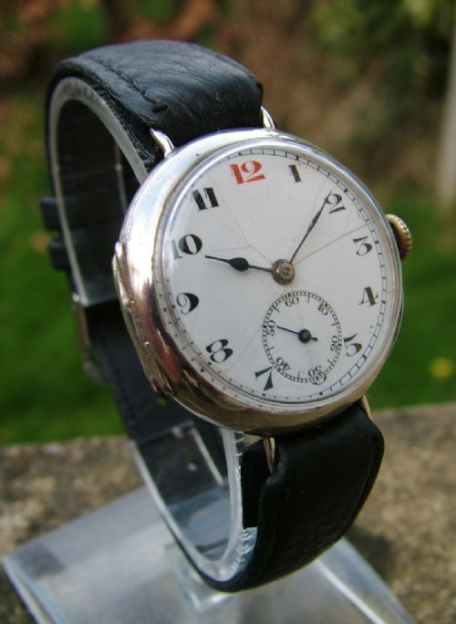 fig 1. Vintage 1923 gents Syren silver trench watch